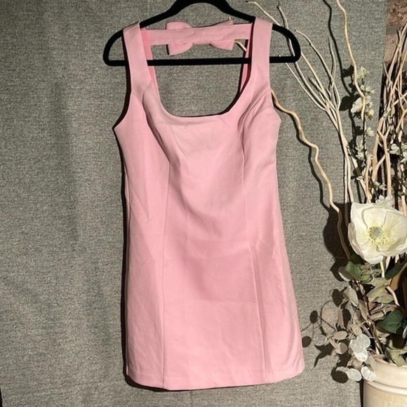 Endless Rose Dresses & Skirts - Anthropologie Endless Rose Cutout Bow Fitted Mini Dress. NWT